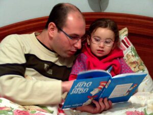 Reading at bed time | Toddler Town Daycare Centers